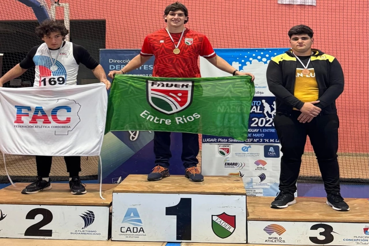 Lucas Mi&ntilde;o en el podio