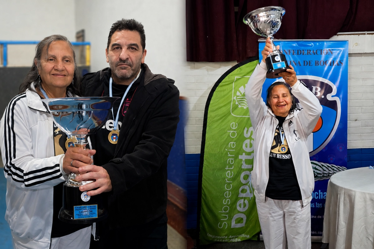 Dora B&aacute;ez con su gu&iacute;a y la copa